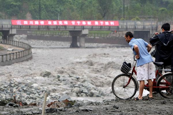 China's National Meteorological Center says rainstorms will pelt the country's southwestern regions over the next three days while the south will continue to experience high temperatures