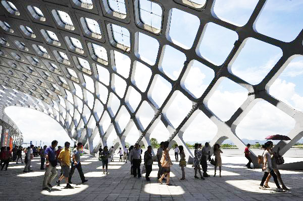 Spectaors walk on the square inside the Shenzhen Bay Sports Center. [Photo/Xinhua] 