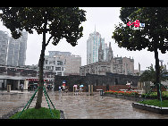 Located in the Ningbo City Center, Tianyi Square is the city's biggest square with an area of 193,000 square meters, 32 percent of which are the green belts. As the one-stop shopping, entertainment and commercial plaza, it is known as the 'Business Aircraft Carrier of Ningbo' and 'name card' of the city. [Cindy Chan/China.org.cn]