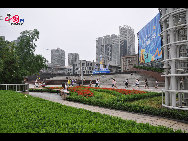 Located in the Ningbo City Center, Tianyi Square is the city's biggest square with an area of 193,000 square meters, 32 percent of which are the green belts. As the one-stop shopping, entertainment and commercial plaza, it is known as the 'Business Aircraft Carrier of Ningbo' and 'name card' of the city. [Cindy Chan/China.org.cn]