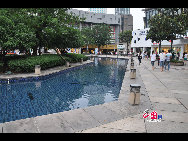 Located in the Ningbo City Center, Tianyi Square is the city's biggest square with an area of 193,000 square meters, 32 percent of which are the green belts. As the one-stop shopping, entertainment and commercial plaza, it is known as the 'Business Aircraft Carrier of Ningbo' and 'name card' of the city. [Cindy Chan/China.org.cn]