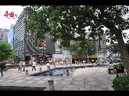 Located in the Ningbo City Center, Tianyi Square is the city's biggest square with an area of 193,000 square meters, 32 percent of which are the green belts. As the one-stop shopping, entertainment and commercial plaza, it is known as the 'Business Aircraft Carrier of Ningbo' and 'name card' of the city. [Cindy Chan/China.org.cn]