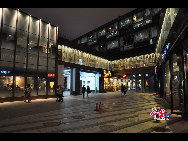 Located in the Ningbo City Center, Tianyi Square is the city's biggest square with an area of 193,000 square meters, 32 percent of which are the green belts. As the one-stop shopping, entertainment and commercial plaza, it is known as the 'Business Aircraft Carrier of Ningbo' and 'name card' of the city. [Cindy Chan/China.org.cn]
