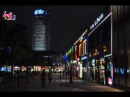Located in the Ningbo City Center, Tianyi Square is the city's biggest square with an area of 193,000 square meters, 32 percent of which are the green belts. As the one-stop shopping, entertainment and commercial plaza, it is known as the 'Business Aircraft Carrier of Ningbo' and 'name card' of the city. [Cindy Chan/China.org.cn]
