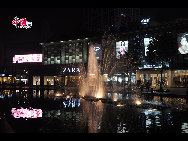 Located in the Ningbo City Center, Tianyi Square is the city's biggest square with an area of 193,000 square meters, 32 percent of which are the green belts. As the one-stop shopping, entertainment and commercial plaza, it is known as the 'Business Aircraft Carrier of Ningbo' and 'name card' of the city. [Cindy Chan/China.org.cn]