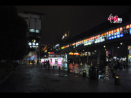 Located in the Ningbo City Center, Tianyi Square is the city's biggest square with an area of 193,000 square meters, 32 percent of which are the green belts. As the one-stop shopping, entertainment and commercial plaza, it is known as the 'Business Aircraft Carrier of Ningbo' and 'name card' of the city. [Cindy Chan/China.org.cn]