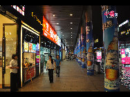 Located in the Ningbo City Center, Tianyi Square is the city's biggest square with an area of 193,000 square meters, 32 percent of which are the green belts. As the one-stop shopping, entertainment and commercial plaza, it is known as the 'Business Aircraft Carrier of Ningbo' and 'name card' of the city. [Cindy Chan/China.org.cn]
