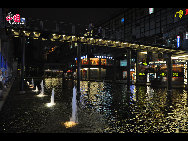 Located in the Ningbo City Center, Tianyi Square is the city's biggest square with an area of 193,000 square meters, 32 percent of which are the green belts. As the one-stop shopping, entertainment and commercial plaza, it is known as the 'Business Aircraft Carrier of Ningbo' and 'name card' of the city. [Cindy Chan/China.org.cn]
