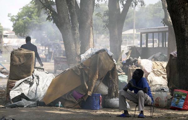 A man sits near his tent in the southern Sudanese city of Juba, July 8, 2011. Sudanese government on Friday officially announced its recognition of South Sudan as an independent state with sovereignty as of Saturday based on the borderline of Jan. 1, 1956. (Xinhua/Nasser Nouri) 