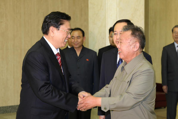 Top leader Kim Jong Il of the Democratic People's Republic of Korea (DPRK) and visiting Chinese Vice Premier Zhang Dejiang pledged in Pyongyang Tuesday to further strengthen the friendly relations between the two neighboring nations. 