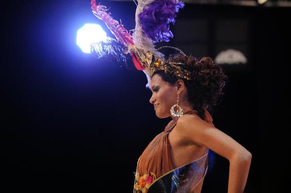 Contestant particapates in the Miss Exclusive of the World International Beauty Contest in Cesme, Turkey, on July 16, 2011.