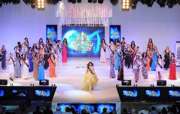 Contestants particapate in the Miss Exclusive of the World International Beauty Contest in Cesme, Turkey, on July 16, 2011.