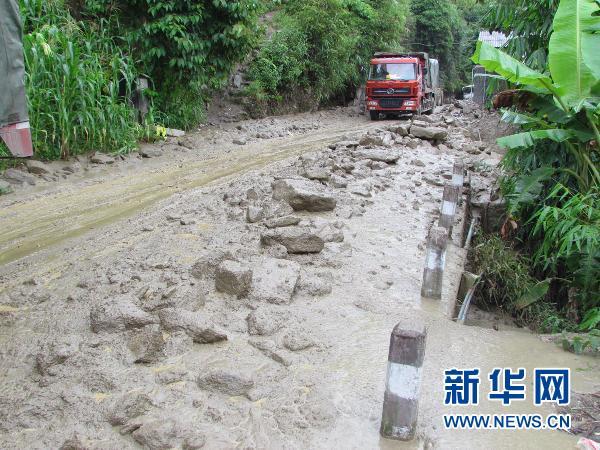 Rainstorm-triggered mudslide damaged the highway in Gongshan area, Yunnan Province, on July 16. Rainstorms and floods in China have killed 355 people since June 1. 