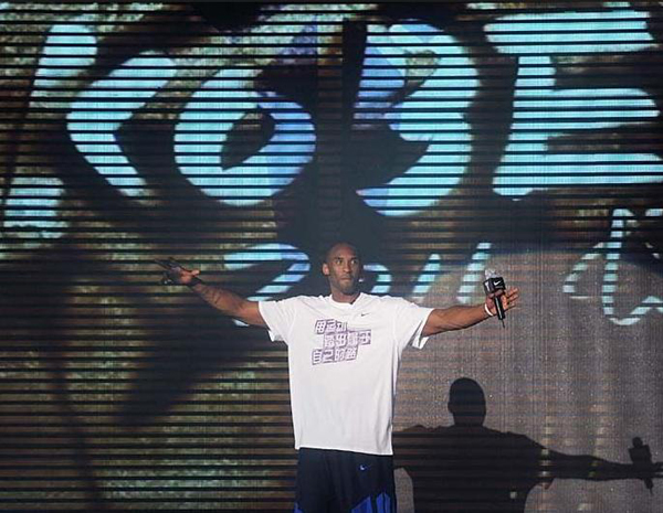 NBA basketball player Kobe Bryant of the Los Angeles Lakers meets fans upon his arrival at a stadium during his 2011 China Tour in Changsha, Central China's Hunan province, July 16, 2011.