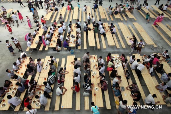 Visitors are seen on the first Beijing International Beer Festival in Beijing, capital of China, July 16, 2011. [Xinhua/Yang Le]