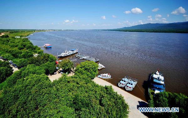 Photo taken on July 17, 2011 shows an aerial view of the Heixiazi Island near Fuyuan County, northeast China's Heilongjiang Province. [Xinhua/Wang Jianwei]