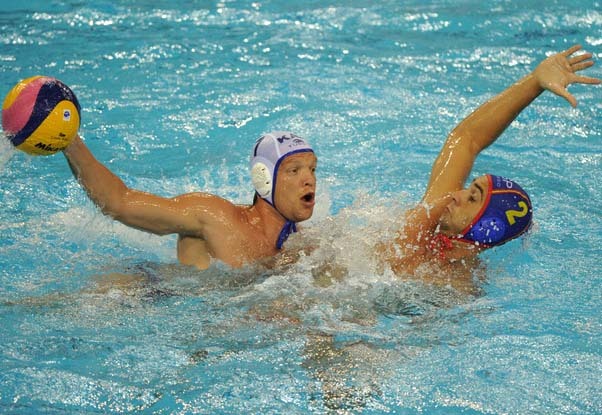 Spain and Kazakhstan compete in their group A men's water polo preliminary round match at the natatorium of the Oriental Sports Center, on July 18, 2011, in Shanghai.