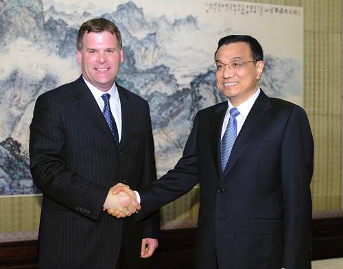 Canadian Foreign Minister John Baird (left) met with Chinese Vice Premier Li Keqiang (right)