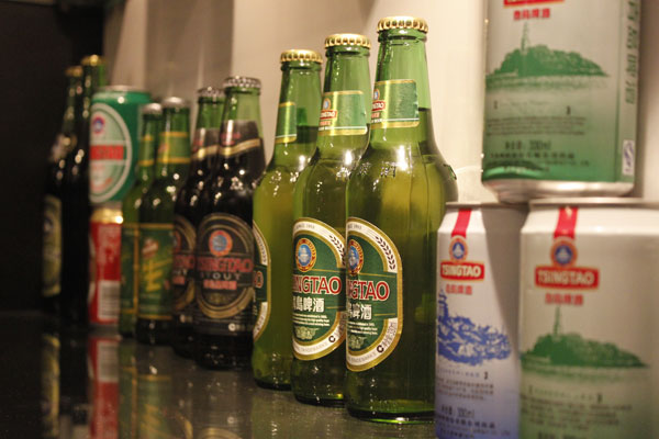 Many varieties of Tsingtao beer are on display at the Tsingtao factory and museum. Guests can learn about the more than 100 year history of the beer, and see the process of making beer in action. [By Lauren Ratcliffe/China.org.cn]