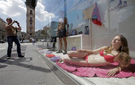 Italian unions had criticised the modelling in COIN department store windows as 'degrading.'