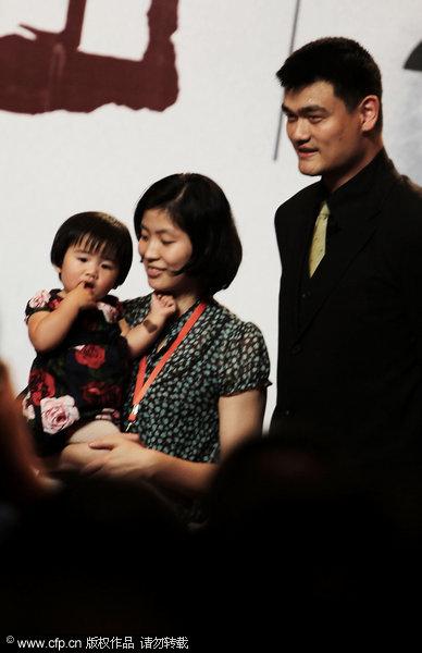 Yao Ming and his family members at the press conference in Shanghai, July 20, 2011. 
