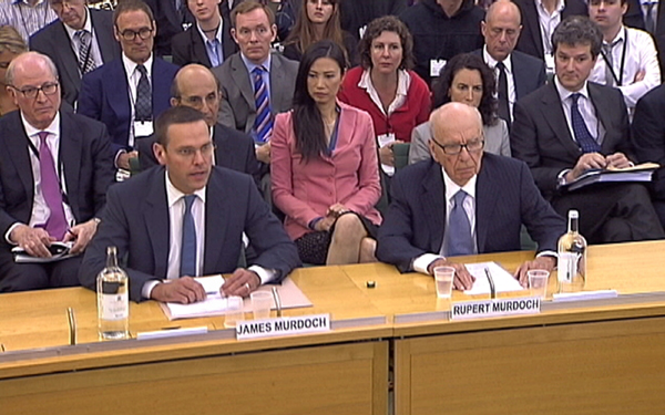 BSkyB Chairman James Murdoch, News Corp Chief Executive and Chairman Rupert Murdoch (R) appear before a parliamentary committee on phone hacking at Portcullis House in London July 19, 2011.  