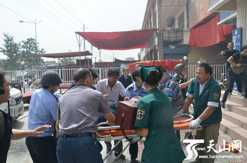 Police shot down 14 rioters who attacked a police station in Hotan city of northwest China's Xinjiang Uygur Autonomous Region on Monday noon. In the picture rescue work is under way.