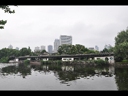 Moon Lake, also known as Yuehu, is located in the downtown district of Ningbo City. It is a great place for a picnic, stroll, or a paddle around the lake in one of the boats available for hire. [Photo by Cindy Chan]