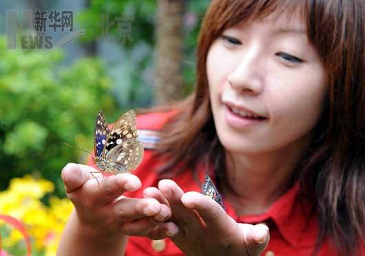A butterfly show, jointly held by Beijing Jingshan Park and Shunyi Butterfly Garden, kicked off in Jingshan Park on Wednesday. 