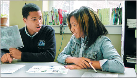 Delmar Evans-Thomas (left), a 10th grade engineering major, and Chanel Sarter, a 12th grade architecture major, practice Chinese in a class at Phelps High School in Washington. Sarter is now in Beijing on a six-week program of language study and cultural immersion. It is sponsored by Americans Promoting Study Abroad China Scholars, which is funded by the US State Department. 