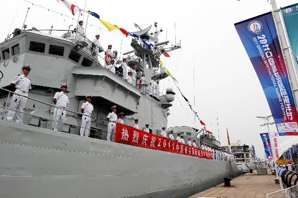 China's missile frigate 'Wuhu' waits for public visit during the 2011 International Marine Festival in Qingdao, east China's Shandong Province, July 23, 2011. 