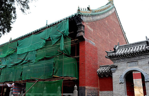 The Shaolin Temple located near Zhengzhou city, Henan province, is under a renovation project in this photo taken on June 29, 2011. The renovation will cost at least 100 million yuan. [Photo: Xinhua]