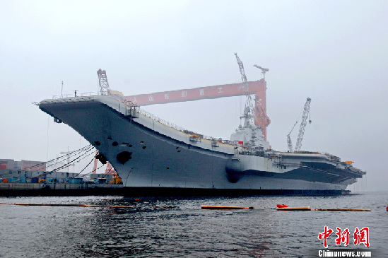 China refurbishes an aircraft carrier for conducting research. [Chinanews Agency]