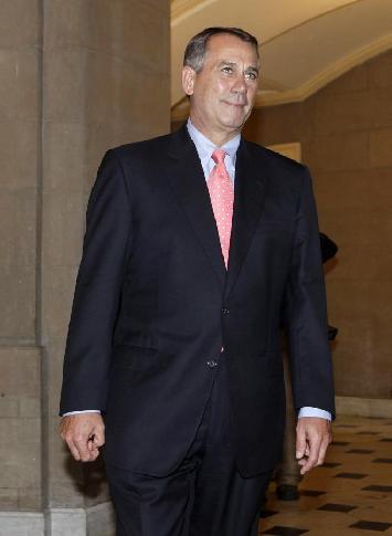 U.S. House Speaker John Boehner returns to his office on Capitol Hill in Washington July 29, 2011. [Xinhua/Reuters Photo]