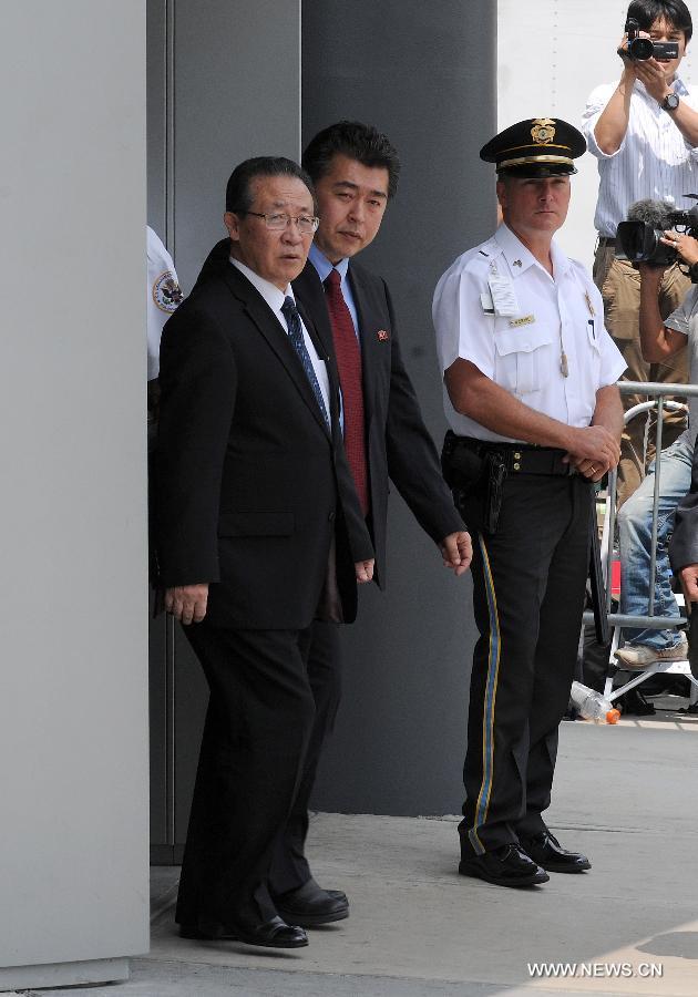 Kim Kye Gwan (L), Vice Foreign Minister of the Democratic People's Republic of Korea (DPRK), walks out of the US Mission to the United Nations in New York, July 29, 2011. [Shen Hong/Xinhua] 