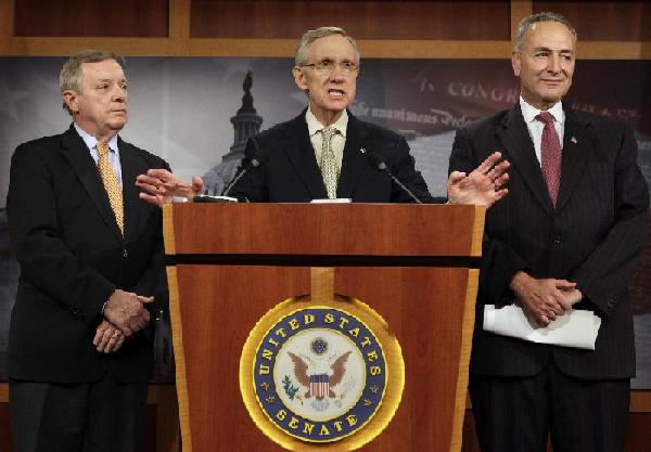 Senate Majority Leader Harry Reid (D-NV) speaks during a joint news conference with Sen. Charles Schumer (D-NY)(L) and Senate Majority Whip Dick Durbin (D-IL) (R) on the Republican Filibuster of Reid's debt plan on Capitol Hill in Washington July 29, 2011. [Xinhua/Reuters Photo]