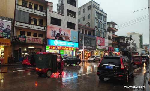 Nock-Ten, the eighth tropical storm and the most powerful one to hit China this year, has made landfall over the southern island province of Hainan.