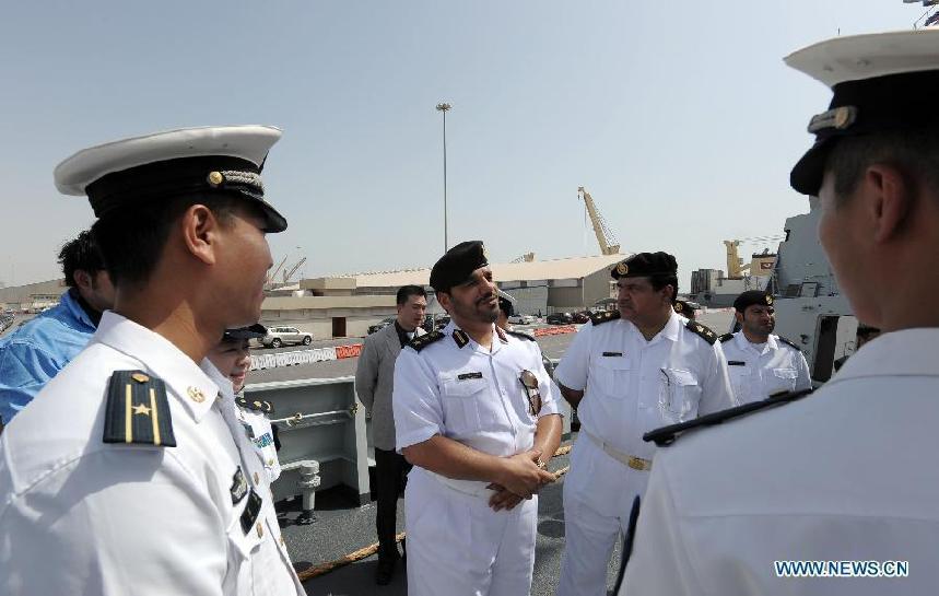 Captain Majid Al Mannai of Katar&apos;s Navy visits Missile frigate Wenzhou of the eighth escort flotilla of Chinese People&apos;s Liberation Army (PLA) Navy in the Gulf of Aden in the port of Doha, capital of Qatar, July 30, 2011. Missile frigate Wenzhou, Maanshan and supply ship Qiandaohu arrived in Doha on Sunday, kicking off the first-ever visit by PLA navy to Qatar, which will last for five days. [Xinhua]