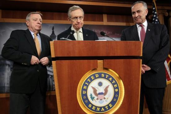 U.S. Senate Majority Leader Sen. Harry Reid (D-NV) (C), Senate Majority Whip Sen. Richard Durbin (D-IL) (L) and Sen. Charles Schumer (D-NY) pause during a news conference after a vote on the Boehner bill at the Senate floor July 29, 2011 at the Capitol in Washington, DC.