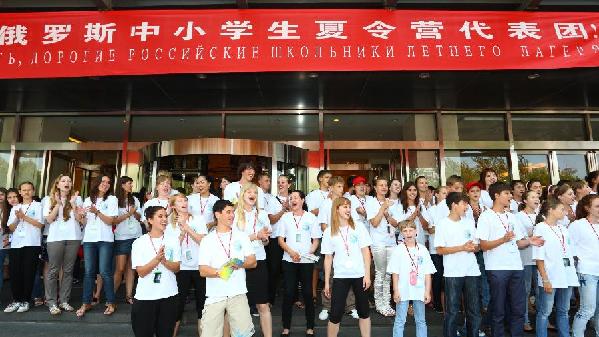 Russian teenagers are seen at the Beijing Capital International Airport in Beijing, capital of China, July 30, 2011. At the invitation of Chinese President Hu Jintao, 450 Russian elementary and secondary school students arrived in China on Saturday, embarking on a 12-day summer camp in China. 
