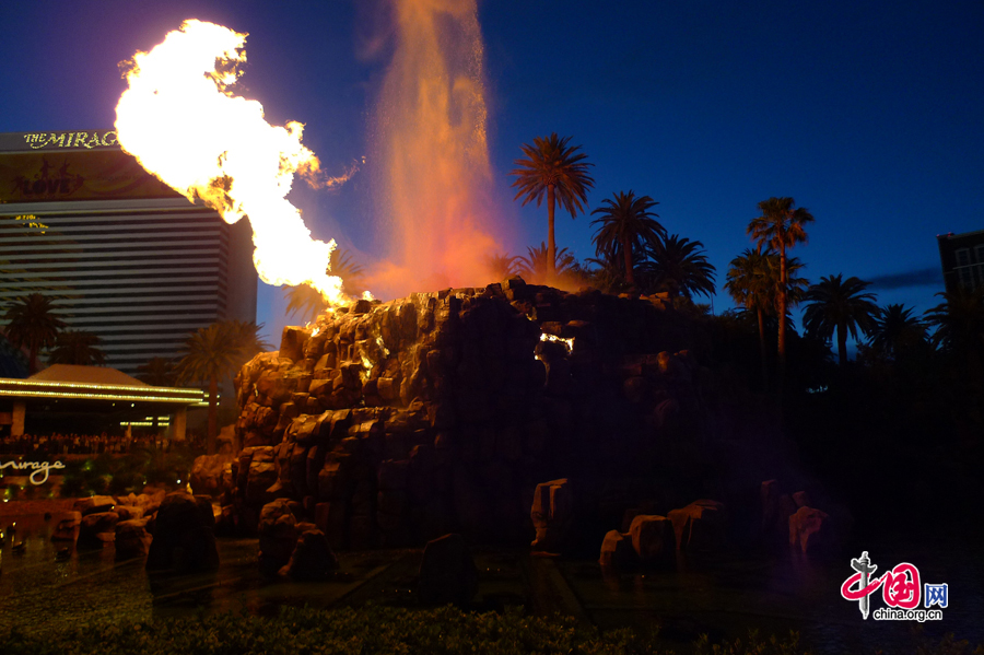 The Mirage's front attraction, the Volcano, 'erupts' regularly at night. Las Vegas, the most populous city in Nevada, United States, is an internationally renowned major resort city for gambling, shopping, entertainment, gourmet food and trade fair. [Photo by Xu Lin / China.org.cn]