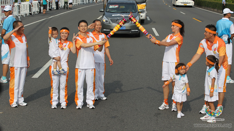 Two families participate the Torch Relay as the creative idea of the 26th Universiade ,Shenzhen,China, August 7,2011. 