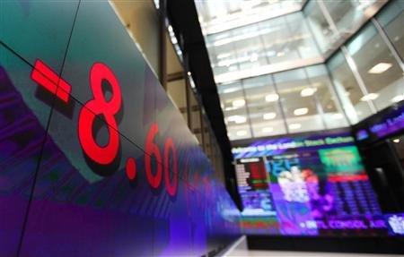 A stock ticker reflects falling stock prices inside the London Stock Exchange August 5, 2011.