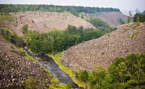 Photo taken on Aug. 7, 2011 shows the Basalt Canyon in Chaihe Township of Zalantun City, Hulun Buir, north China's Inner Mongolia Autonomous Region. Photo: Xinhua