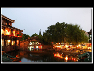Zhouzhuang, one of the most famous water towns in China, is sited in Kunshan City, 30 kilometers southeast of Suzhou. With a history of more than 900 years, it keeps the style and pattern of an ancient water village. It is noted for its profound cultural heritage, well-preserved ancient residential houses, elegant watery views, and traditions and customs with a strong local flavor. [D80对酒当歌/bbs.fengniao]