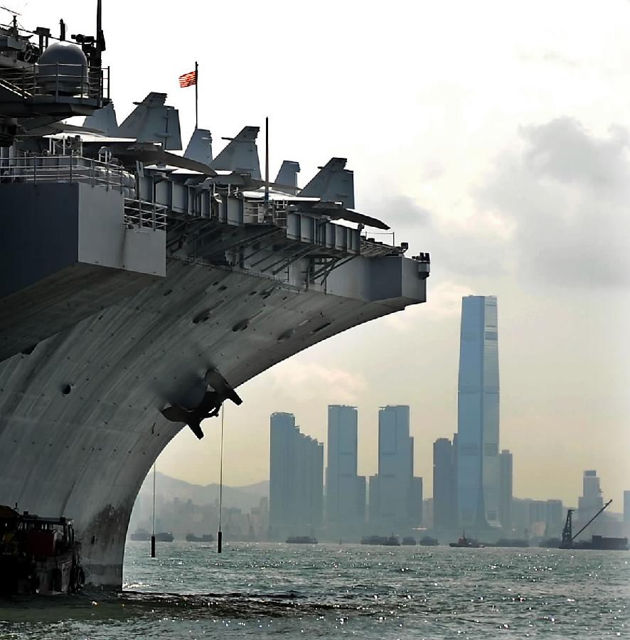 Photo taken on Aug. 13, 2011 shows a part of the USS Ronald Reagan Aircraft Carrier which is anchored in Hong Kong. The USS Ronald Reagan Aircraft Carrier and its three support ships arrived in Hong Kong on Friday for a four-day port visit, which is its fourth visit here. [Chen Xiaowei/Xinhua] 
