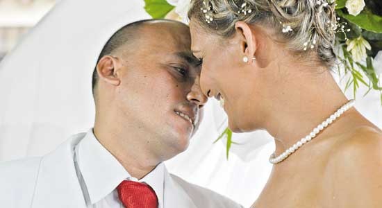 Cuban transsexual bride Wendy Iriepa and her groom Ignacio Estrada kiss on Saturday, in Havana, during the first transsexual wedding in Cuba. 