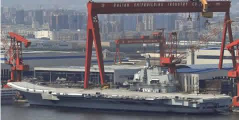 In waters off Liaoning Province in northeastern China, where the country's first aircraft carrier concluded its four-day sea trial Sunday morning. It has sailed back to Dalian port where more refitting efforts will be carried out. 