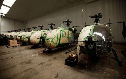 Former Ministry of Defence Gazelle helicopters lined up in a warehouse waiting for potential buyers. [Agencies]