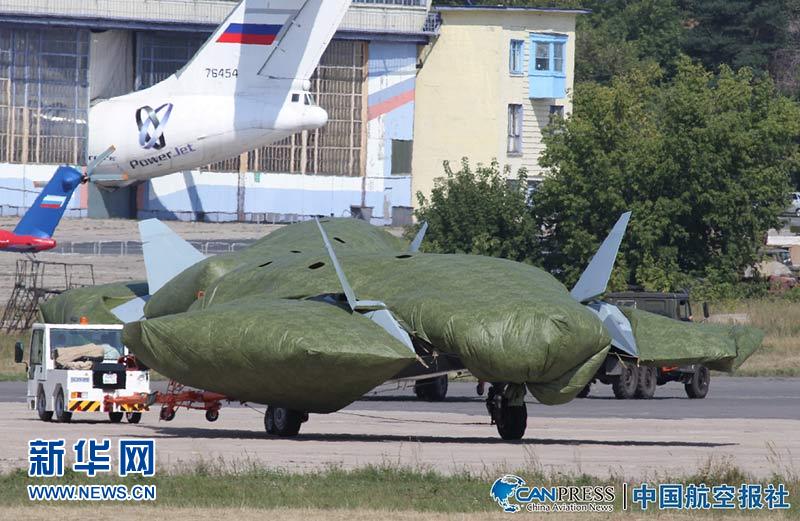 Photo of the new twin-engine T-50 fighter near Moscow. MAKS 2011, an international air show, will be held in the small science town of Zhukovskiy, 25 miles southeast of Moscow from Aug. 16-21, 2011.[Xinhuanet]